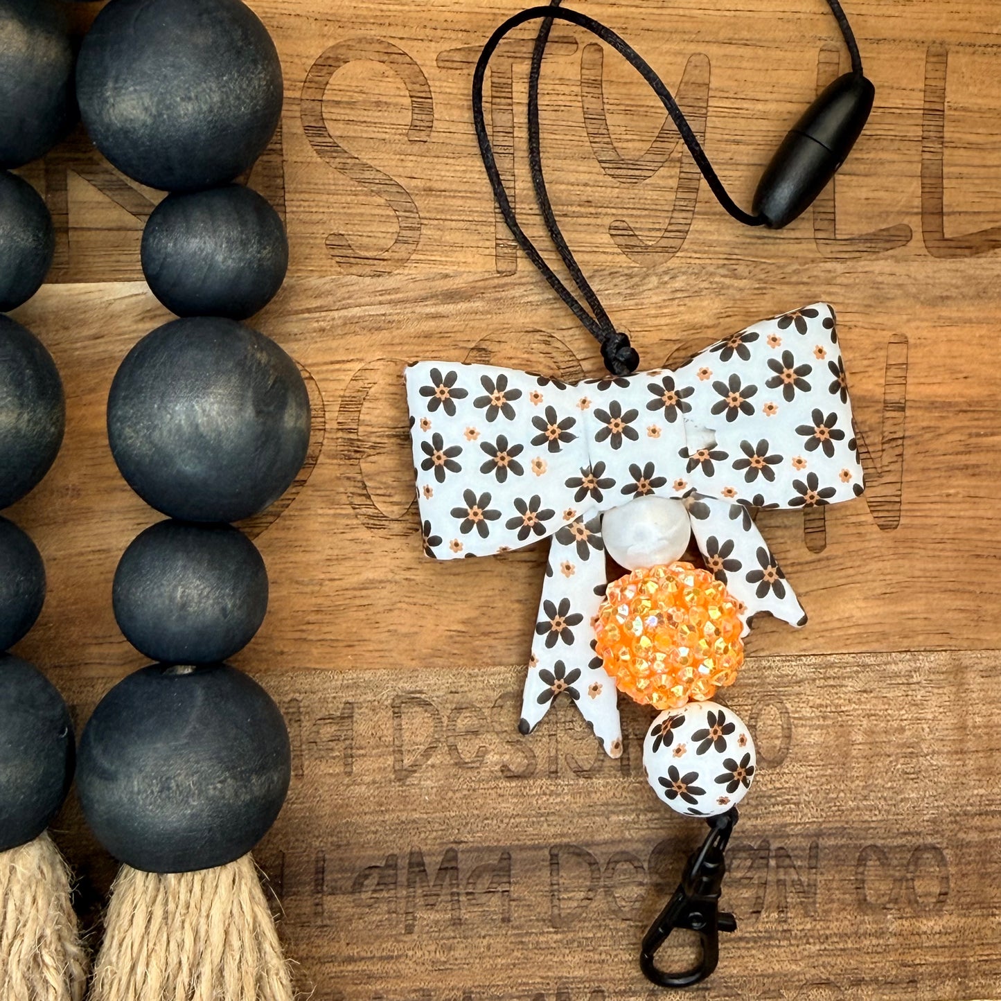 Beaded Car Charm / Freshie Hanger – Black/Orange Floral Bow