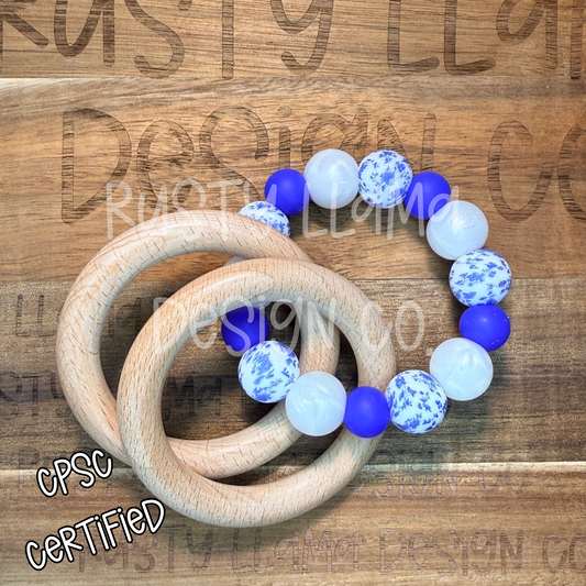 CPSC-Certified Silicone & Wood Baby Rattle – Blue Floral