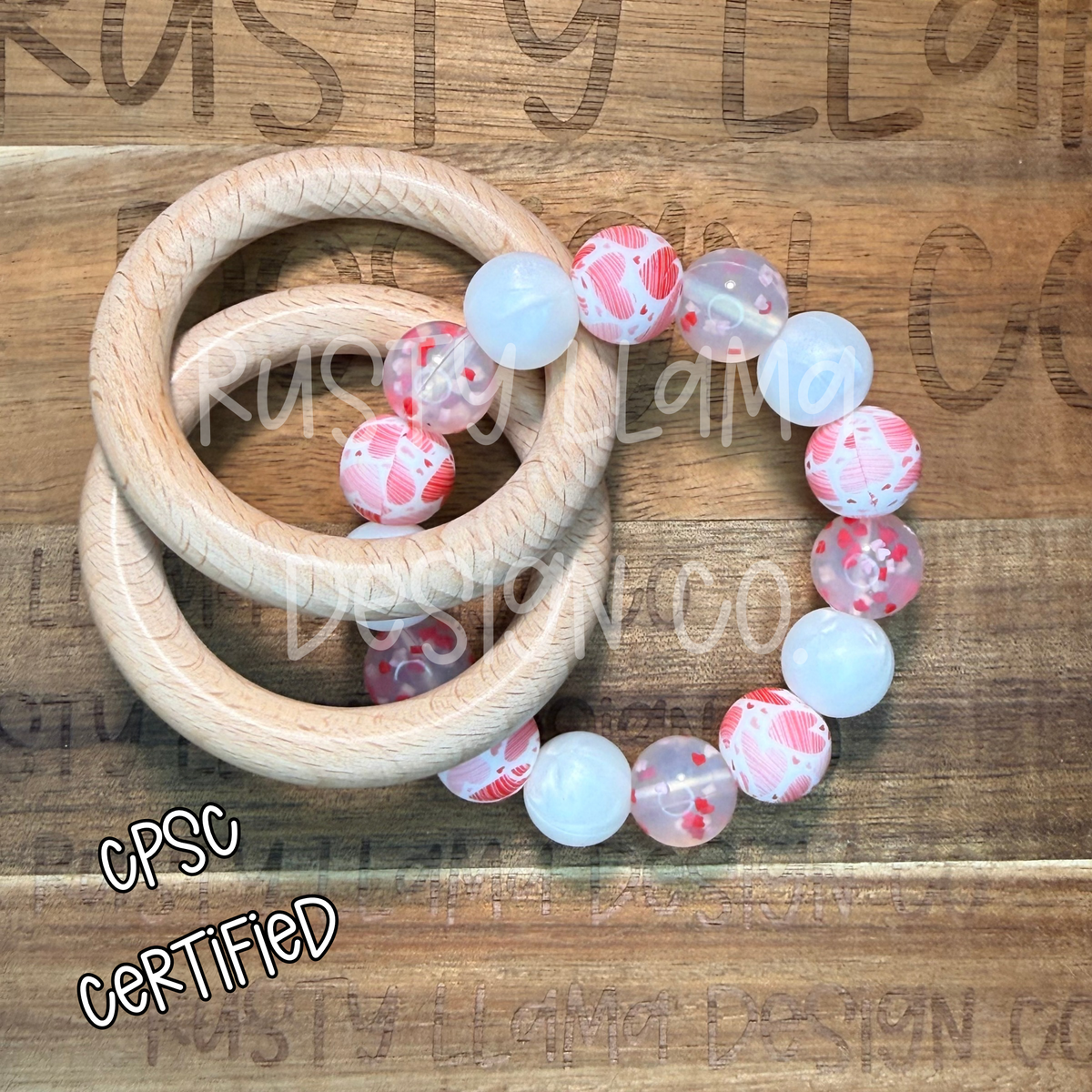 CPSC-Certified Silicone & Wood Baby Rattle – Pink Hearts